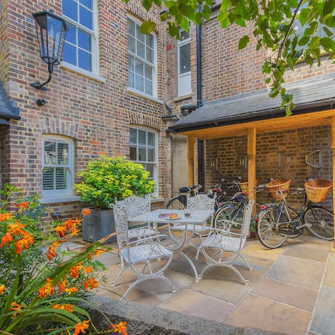 Enjoy spells of unseasonably warm weather in the shared courtyard