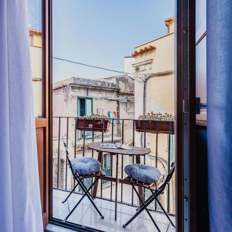 People-watch from the private balcony