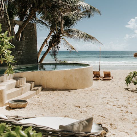 Plunge into your private pool overlooking the Caribbean Sea