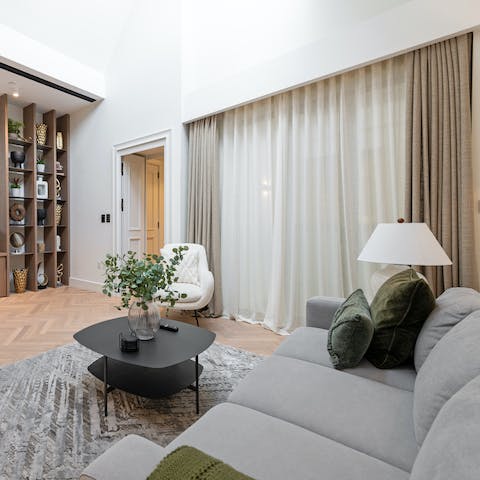 Make yourself comfortable on the sofa with a cup of coffee in hand