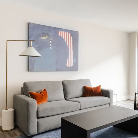 Stretch out in the living area after a day of exploring the city