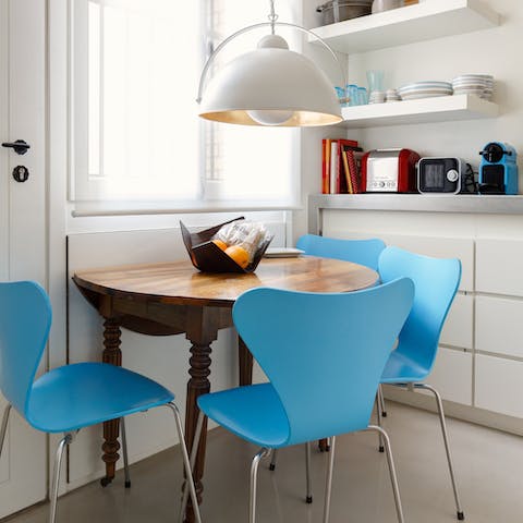 Designer chairs around the breakfast table