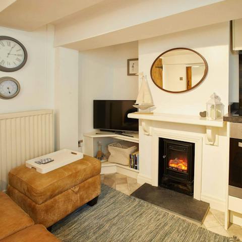 Experience a lovely sense of relaxation and warmth in the living room