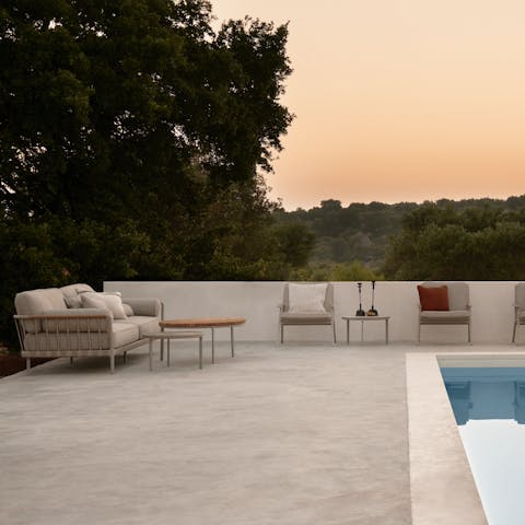 Relax with a bottle of wine on the terrace as the sun sets