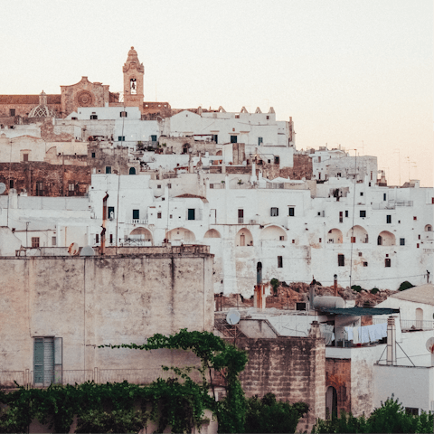 Take a fifteen-minute drive to the whitewashed town of Ostuni