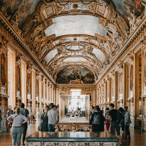 Make the thirty-minute walk to the Louvre