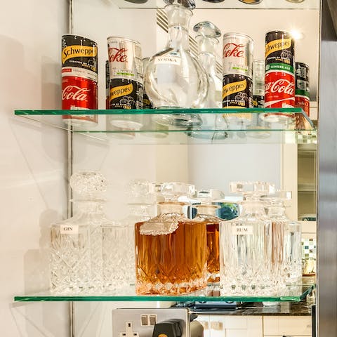 Enjoy a few tipples from the complimentary bar