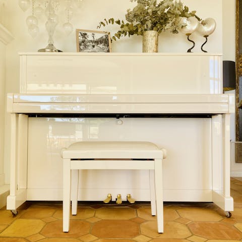 Create your own background music at the upright piano