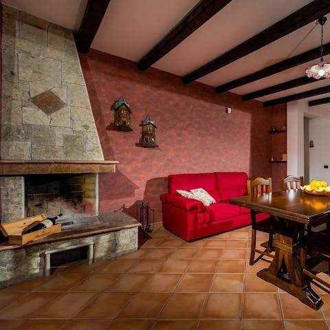 Embrace your Sicilian locale with wood-beams and an old stone hearth