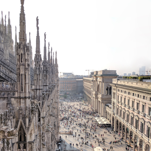 Hop on the nearby Metro and head to Milan's Duomo