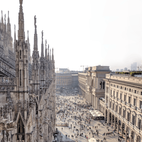 Hop on the nearby Metro and head to Milan's Duomo