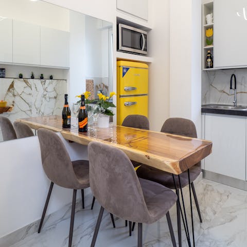 Toast the day's end with a glass of fizz in the smart kitchen