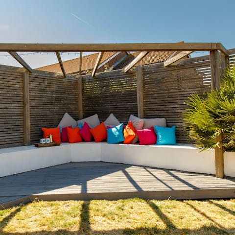 Settle down with a cup of tea and a good book in the generous garden