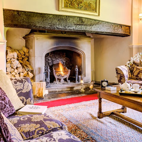 Warm up next to the wood-burning fire after a bracing walk