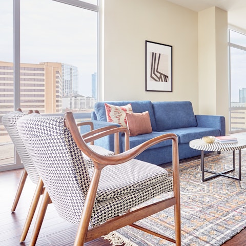 Relax in your home's stylish living room with views