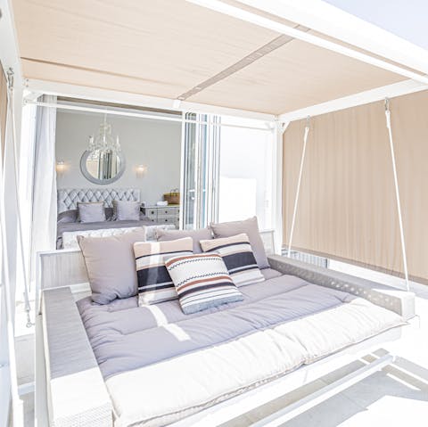 Find your quiet corner on the swing bed and enjoy your holiday romance book