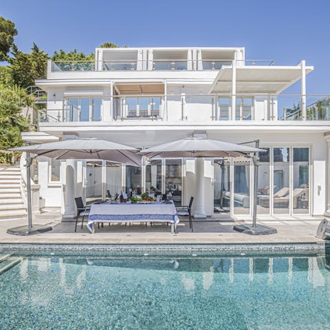 Refresh yourself in the crystalline private pool before going back to sunbathing