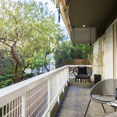 Listen to the soothing soundscape of the Athenian Riviera from the balcony