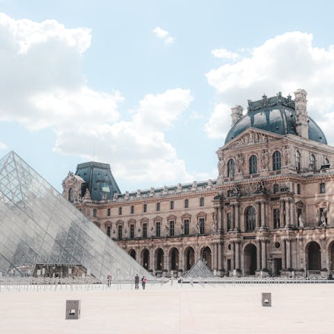 Explore the stunning artworks at the nearby Louvre Museum