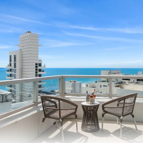 Pad out to the balcony and watch the sunset