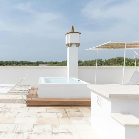 Head up to the terrace and relax in the Jacuzzi