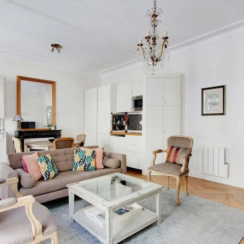 Relax in the open-plan living room with a glass of Champagne