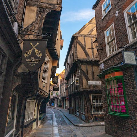 Delve into the narrow, winding streets of The Shambles – its independent boutiques and quirky cafes are a five-minute-walk away