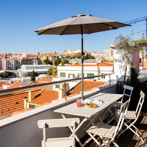 Share a bottle of wine alfresco on the balcony, soaking up the evening sun