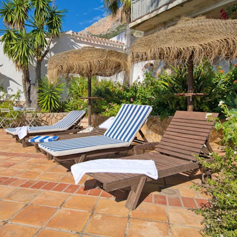 Soak up the Spanish sun on the loungers