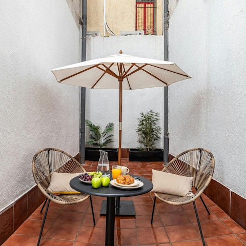 Enjoy relaxed moments on the terrace over coffee or cocktails