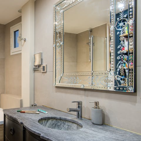 Get ready in the striking Venetian mirror