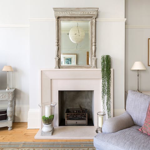 Cosy up by the fireplace