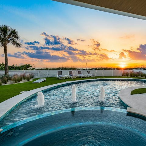Watch the sunset from the pool or hot tub