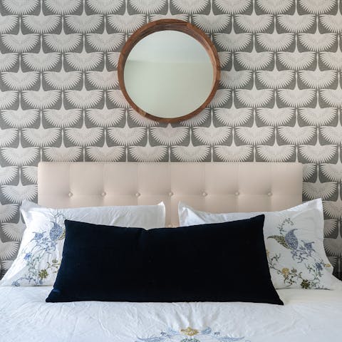 The winged wallpaper in the bedroom