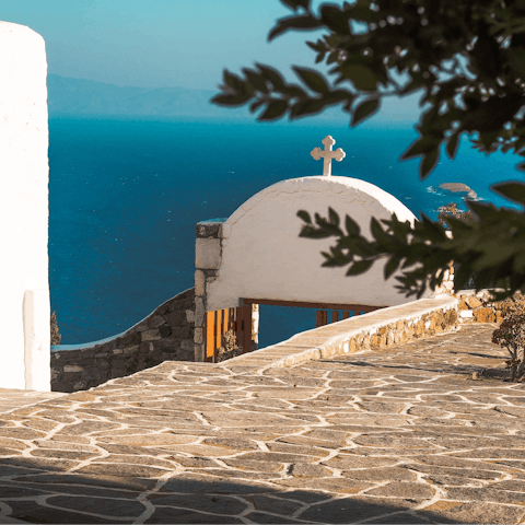 Stay in Dryos, a small village a half-hour drive from Paros Town