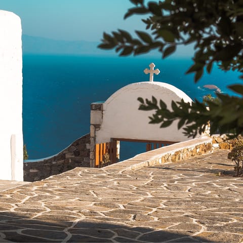 Stay in Dryos, a small village a half-hour drive from Paros Town