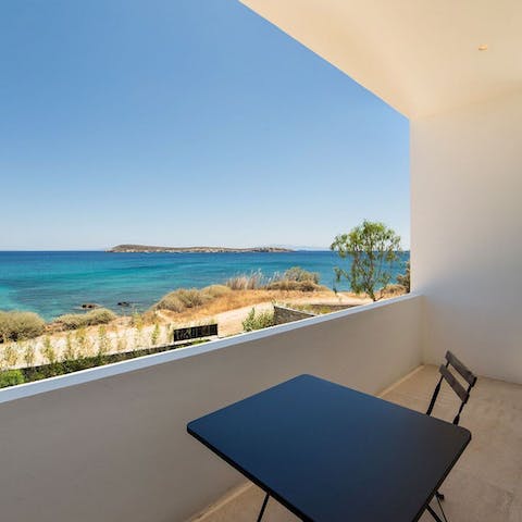 Enjoy your morning coffee on the balcony and admire the Aegean Sea views
