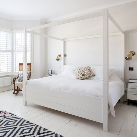 Sleep like a baby in the super-king four-poster bed