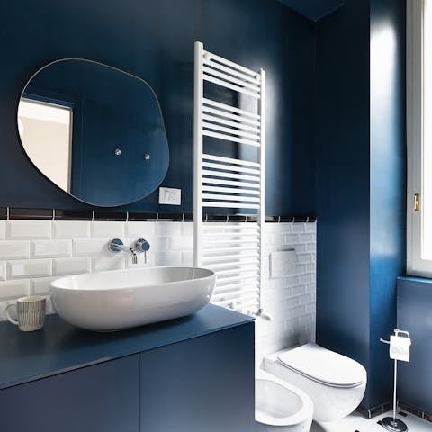 A deep blue bathroom