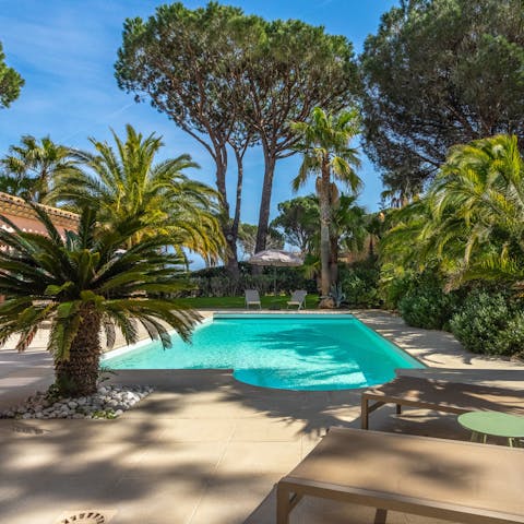 Find total relaxation while lounging by the pool