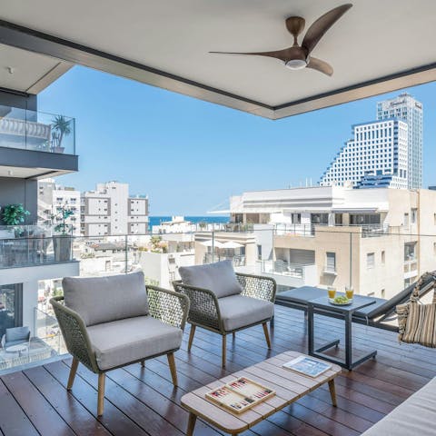 Savour morning coffees and sea views on the terrace