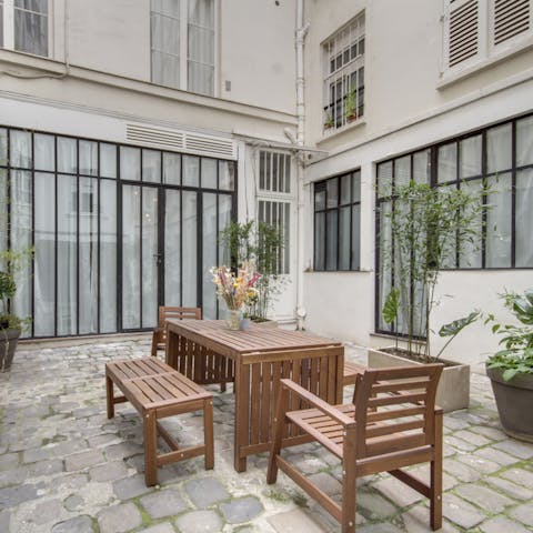 Head out to the shared courtyard to enjoy your morning coffee in the fresh air