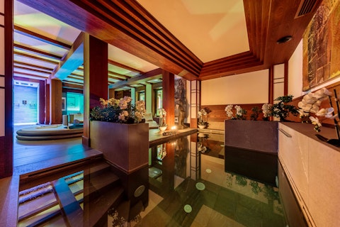 Slip into the private indoor pool ringed with orchids and candlelight
