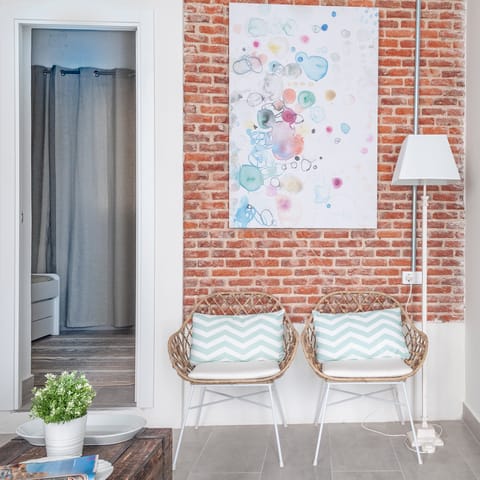 The exposed brick wall