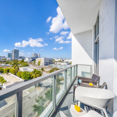 Enjoy city skyline views from your private balcony