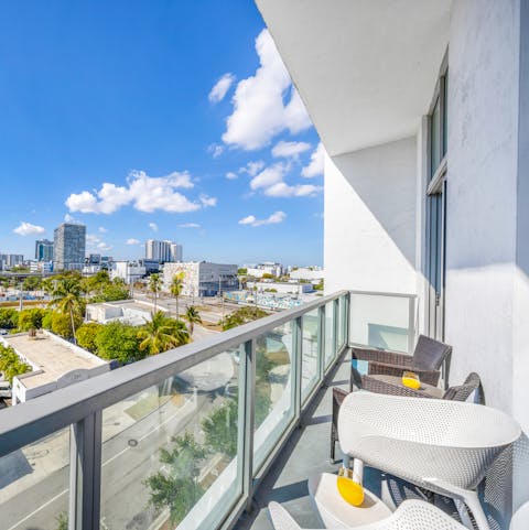 Enjoy city skyline views from your private balcony