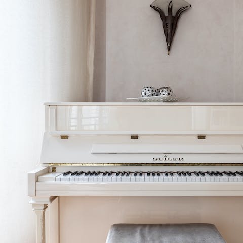 Striking white piano