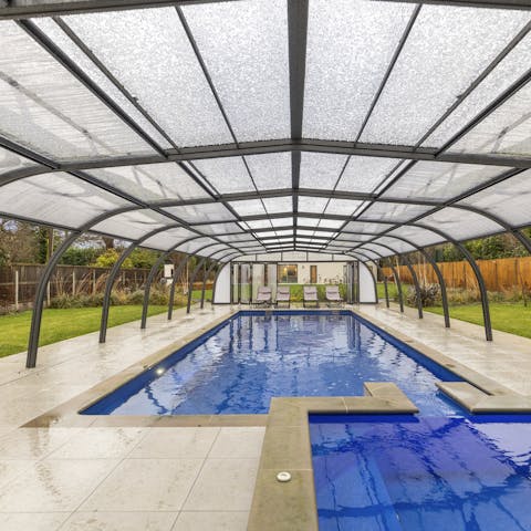 Splash about in the private heated swimming pool