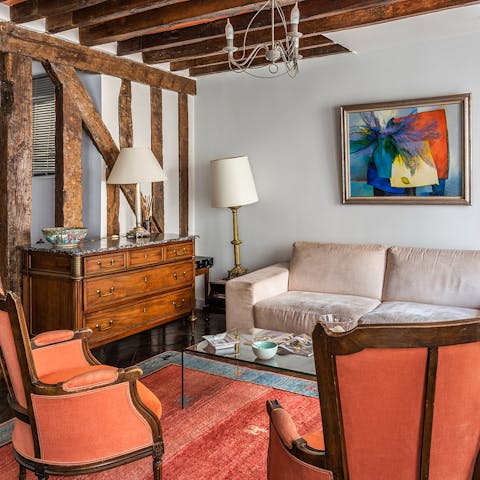 Find a cosy spot to enjoy a good book in the rustic living room