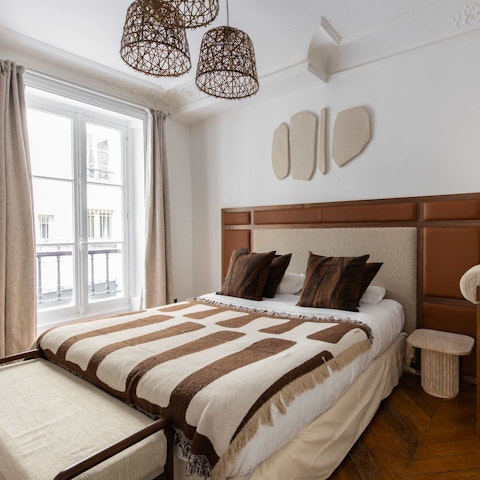 Watch the Parisian bustle from the Juliet balconies